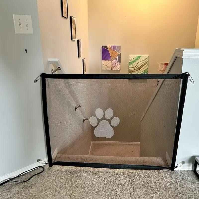 An easy-to-fold pet barrier that requires no drilling to ensure home security and protection without the use of a stand. black