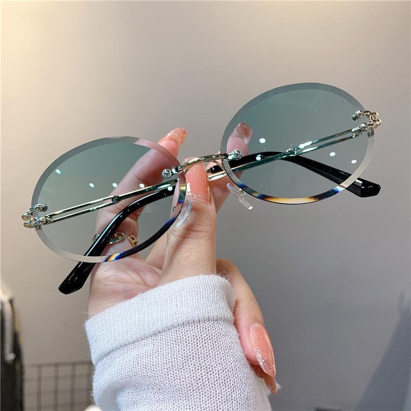 New Retro Oval Sunglasses for Women Small Round Frame Gradient Color Frameless Diamond Cut Edge Eyewear as picture