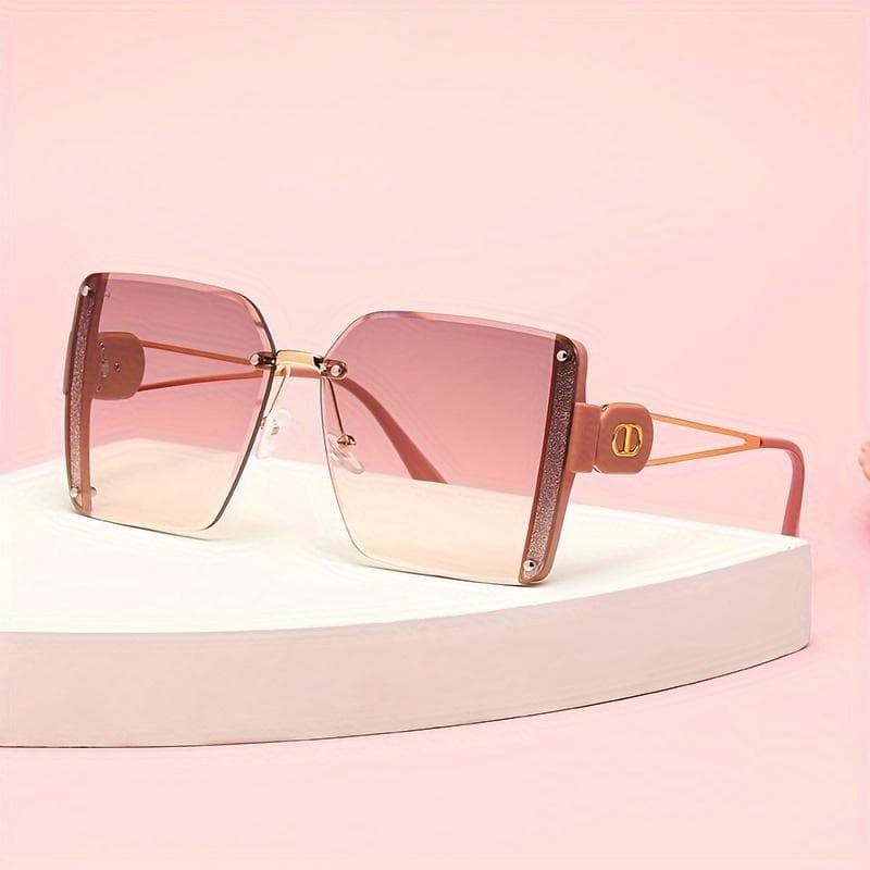 Trendy womens frameless metal sunglasses Fashion travel sun protection UV blocking cutting edge design