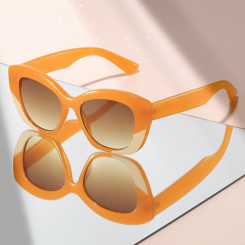 New artistic cat-eye sunglasses with color contrast embellishment for high-end travel style