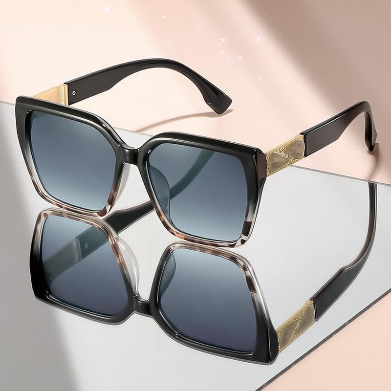 Large framed color blocking fashion sunglasses with high end design and imitation gemstone embellishments