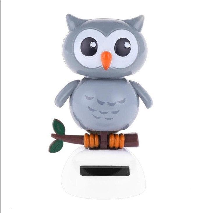 Car decoration accessories car solar decoration cartoon creative shaking his head cute owl grizzly doll doll gift