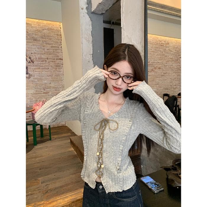 Sweet and Spicy Slim Long-sleeved Knitted Cardigan for Women Early Autumn New Strap Design Slimming Short V-neck Long-sleeved Top One Size