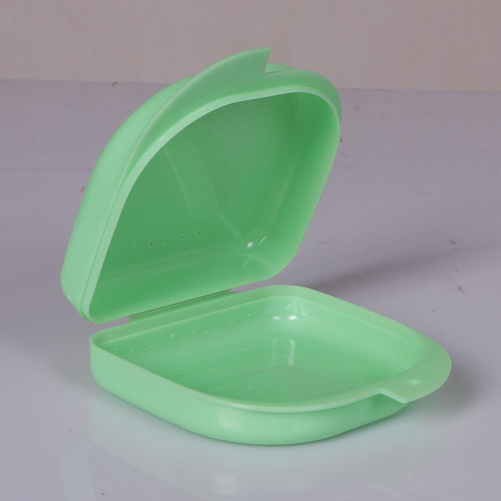 Orthodontic braces box oral cavity with orthodontic retainer box dentures placed dental half-mouth