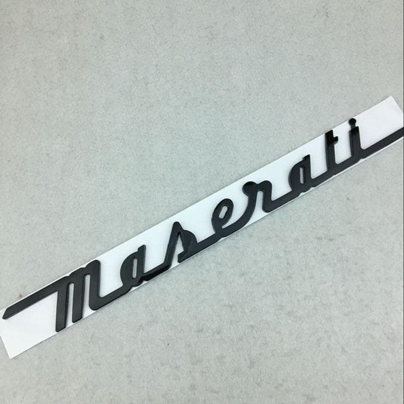 Luxurious Maserati President Ghibli Q4 Gts Car Tail Emblem With Smooth Lines And Classic Appeal black
