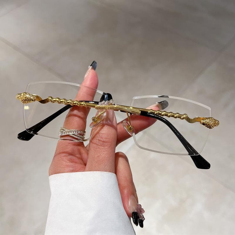 Luxury Vintage Rimless Sunglasses Women Fashion Trendy Snake Frame Gradient UV400 Sun Glasses For Men And Women As The Picture