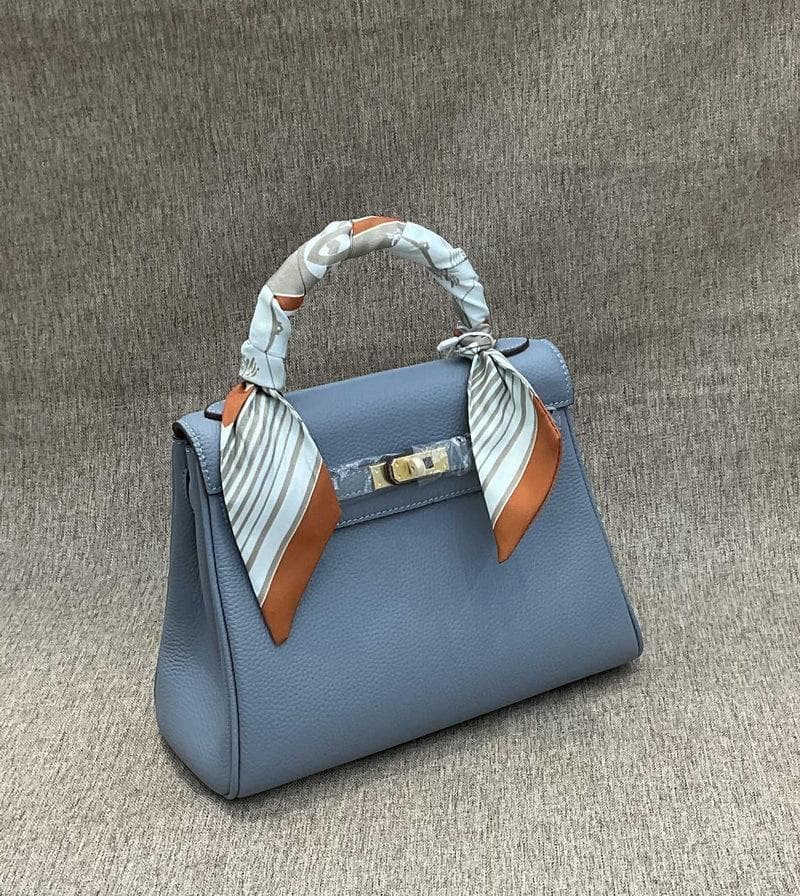 New Top Layer Cowhide TOGO Leather 2528 Women's Backpack With Shoulder Strap Hand-held Single Shoulder Diagonal Cross Women's Trendy Bag 25x10x18cm light blue