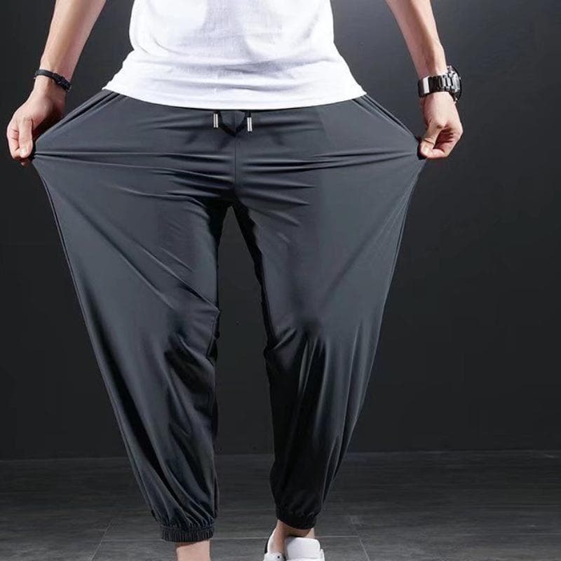Summer Quick-drying Ice Silk Casual Pants Men's Ultra-thin Elastic Nine-point Pants Loose Drape Solid Beam Feet Pants 6XL dark gray