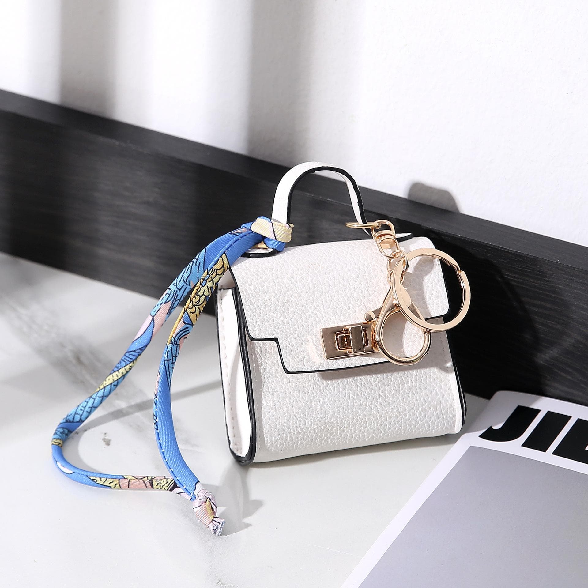 Mini bag pendant, house small bag, light luxury bag, new fashion decoration, red envelope, headphones, charter key bag white