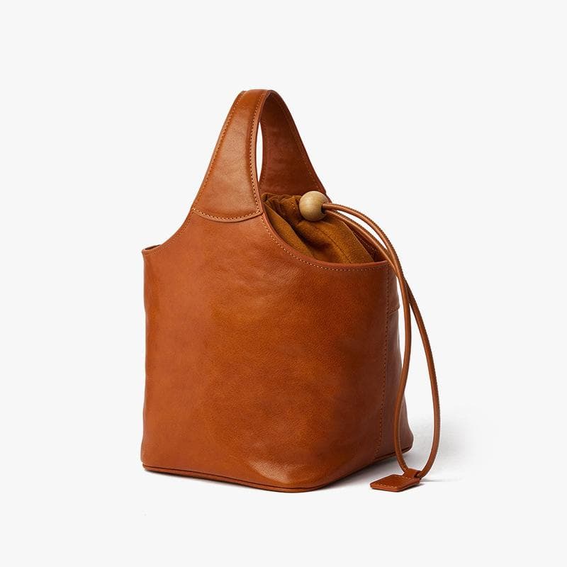 Retro Top-grain Leather Flower Basket Bag with A High-end Feel, Fashionable Vegetable Basket, Niche Design, and Commuting Bucket Bag