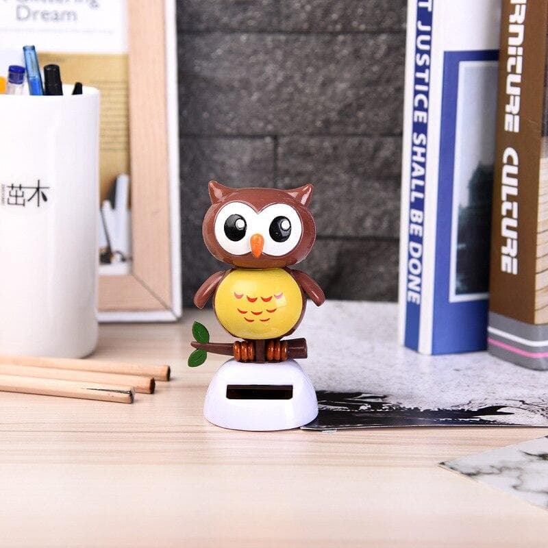 Car decoration accessories car solar decoration cartoon creative shaking his head cute owl grizzly doll doll gift