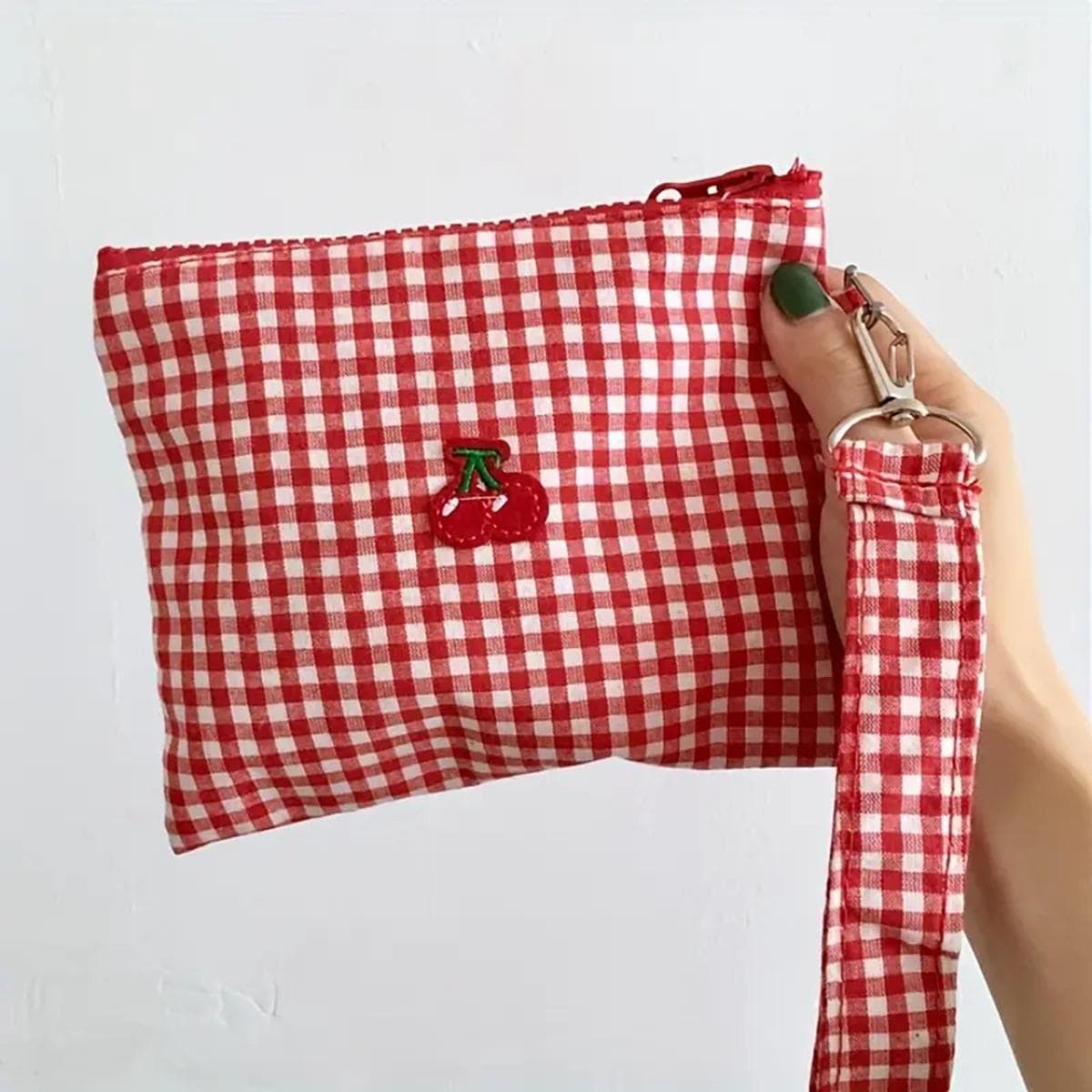 Red cherry canvas makeup bag, portable and easy to carry. Red plaid, large capacity cosmetic lipstick storage bag. red