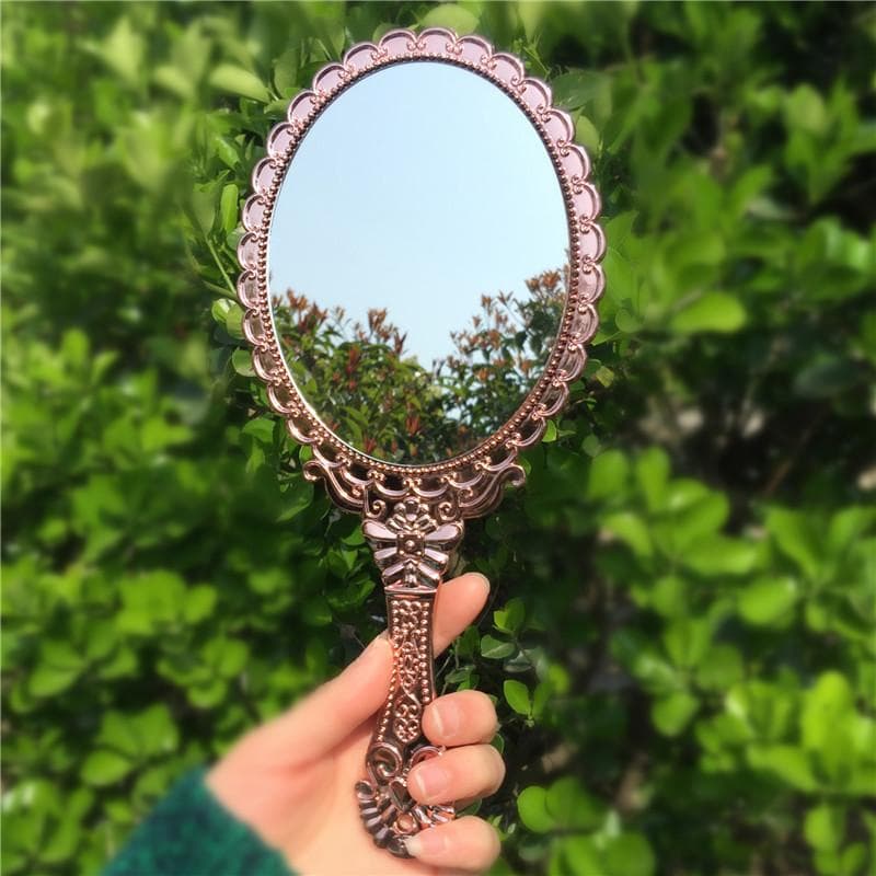 Creative retro carving hand-held vanity mirror Female handle makeup mirror portable portable small round mirror makeup tools gold