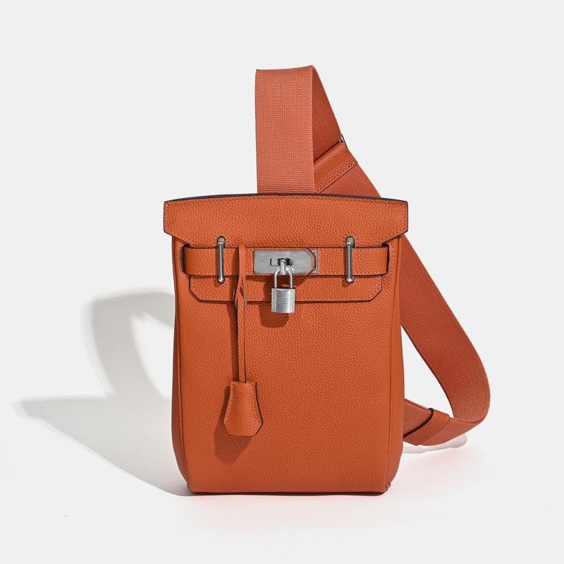 2025 New Unisex Top Layer Cowhide Chest Bag Shoulder Bag Genuine Leather Backpack With Lock Hanging Decoration 17 x 8 x 27CM+silver buckle orange
