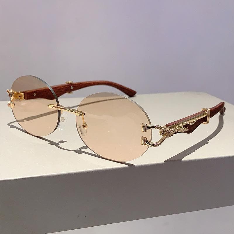 Luxury Designer Vintage Rimless Oval Sunglasses Trendy Punk Metal Leopard Eyewear For Women Men